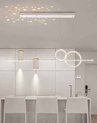 Modern kitchen with pendant lights and white cabinetry