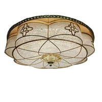 Decorative ceiling light fixture with floral designs 
