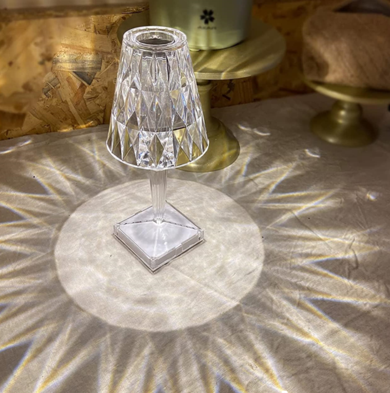 Touch Sensitive Rechargeable Atmosphere Making Table Lamp.